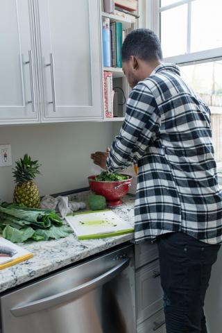 image tagged with millennial, african-american, kitchen, man, fruit, …;