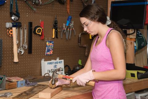 image tagged with girl, wood, wood-work, hammer, woman, …;