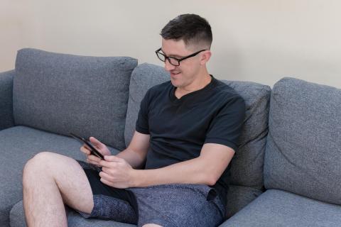 image tagged with couch, looks, man, glasses, look, …;