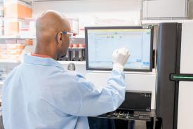image tagged with screen, machinery, researcher, man, african-american, …;