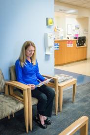 image tagged with adult, waits, doctor's office, waiting room, lady, …;