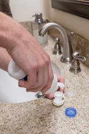 image tagged with holding, sink, faucet, multi-purpose solution, holds, …;