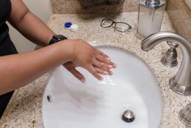 image tagged with sink, glasses, hands, case, finger, …;