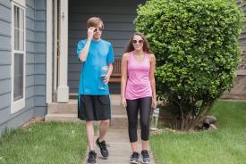 image tagged with sibling, sunglasses, patio, run, running, …;