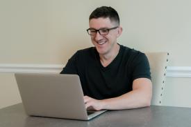 image tagged with glasses, man, computer, sits, looking, …;