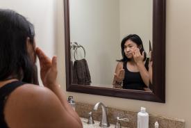 image tagged with grooming, mirror, scrub, woman, washroom, …;