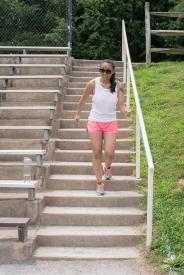 image tagged with walking, bleachers, gym clothes, stairs, sunglasses, …;