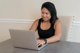 image tagged with looks, laptop, asian-american, asian, working, …;