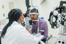 image tagged with eye exam, african-american, vision, exam room, man, …;