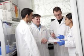 image tagged with diverse, scientists, lab, lab coats, laboratory, …;
