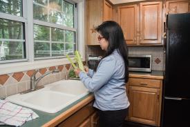 image tagged with sink, home, kitchen, woman, glasses, …;