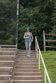 image tagged with female, outdoors, athletic, climb, stairs, …;