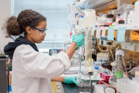 image tagged with african-american, lab coat, laboratory, intern, bottle, …;