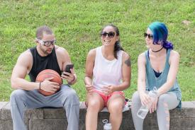 image tagged with sit, glasses, outdoors, latinx, ball, …;
