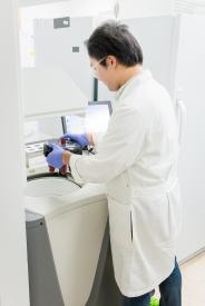 image tagged with machine, coat, laboratory, technology, gloves, …;