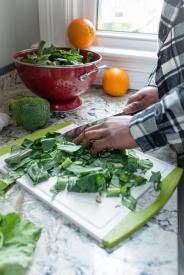 image tagged with greens, broccoli, cutting, cutting board, food prep, …;