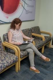 image tagged with sits, handout, doctor's office, girl, waiting, …;
