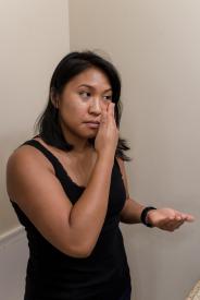 image tagged with hands, washroom, woman, asian-american, face, …;