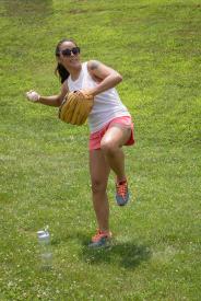 image tagged with throws, woman, bottle, baseball, glove, …;