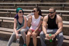 image tagged with sunglasses, female, talking, bench, asian-american, …;