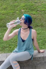 image tagged with bottle, millennial, sits, thirsty, sunglasses, …;