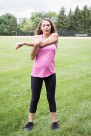 image tagged with park, field, stretch, stretching, woman, …;