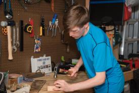 image tagged with safety, millennial, boy, workshop, tools, …;