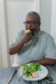 image tagged with leafy greens, meal, table, african-american, man, …;