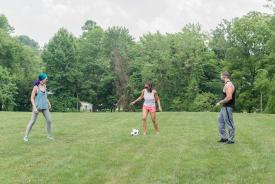image tagged with ball, park, african-american, woman, asian-american, …;