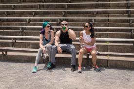 image tagged with sitting, sunglasses, physical activity, male, bleachers, …;