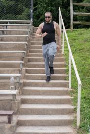 image tagged with exercise, athletic, stairs, glasses, man, …;