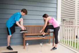 image tagged with running, siblings, bench, man, laces, …;