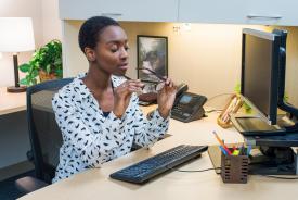 image tagged with supplies, african-american, female, sit, workplace, …;