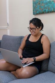 image tagged with working, couch, woman, asian-american, computer, …;