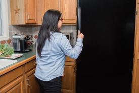 image tagged with standing, latina, fridge, girl, female, …;