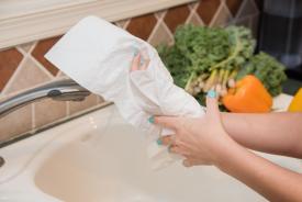 image tagged with paper towel, towel, sink, drying, hand, …;
