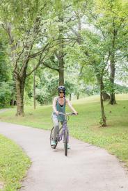 image tagged with biking, trail, caucasian, woman, helmet, …;
