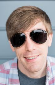 image tagged with man, sunglasses, closeup, guy, smiles, …;