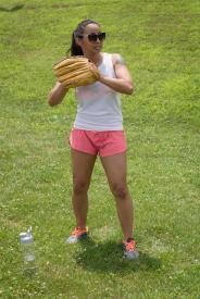 image tagged with exercising, asian-american, baseball, woman, outside, …;