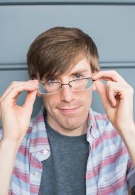 image tagged with closeup, glasses, eyes, man, hands, …;