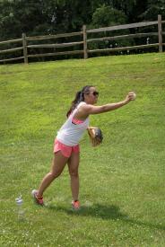 image tagged with outside, throwing, pitch, baseball, girl, …;