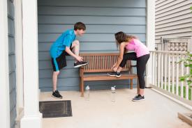 image tagged with patio, bench, man, siblings, girl, …;
