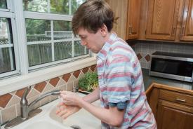 image tagged with hands, kitchen, male, caucasian, sink, …;