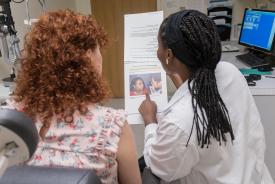 image tagged with patient, women, african-american, handout, clinic, …;