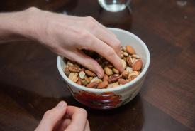 image tagged with hand, holds, nuts, healthy food, eat, …;