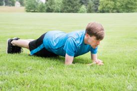image tagged with outside, park, field, fitness, plank, …;