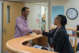 image tagged with handshake, doctor's office, african-american, hands, male, …;