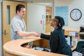 image tagged with smile, african-american, adult, clinic, handshake, …;