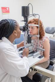 image tagged with women, provider, check up, exam, slit lamp, …;