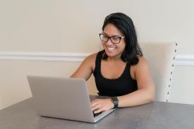 image tagged with hispanic, asian-american, computer, laptop, glasses, …;